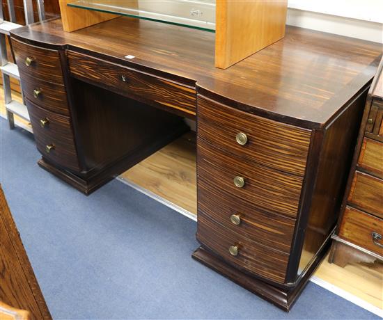 A rosewood and macassar Art Deco pedestal desk